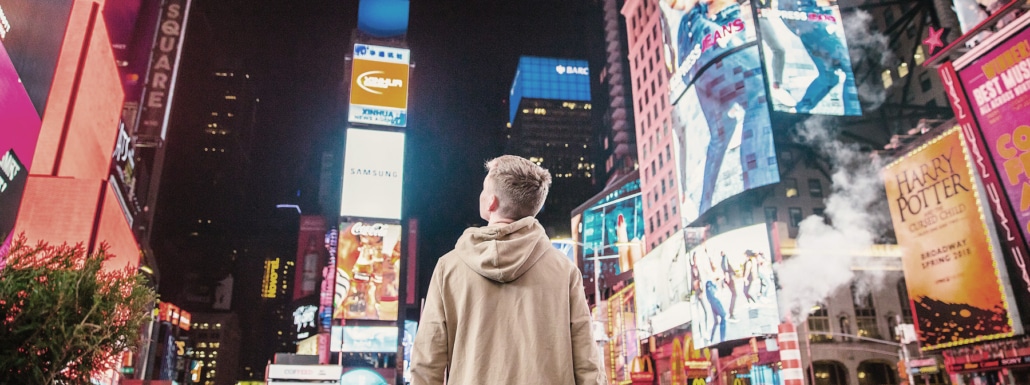 Illuminated advertising and billboards on Times Square in New York - symbolic image for visual communication and the power of images