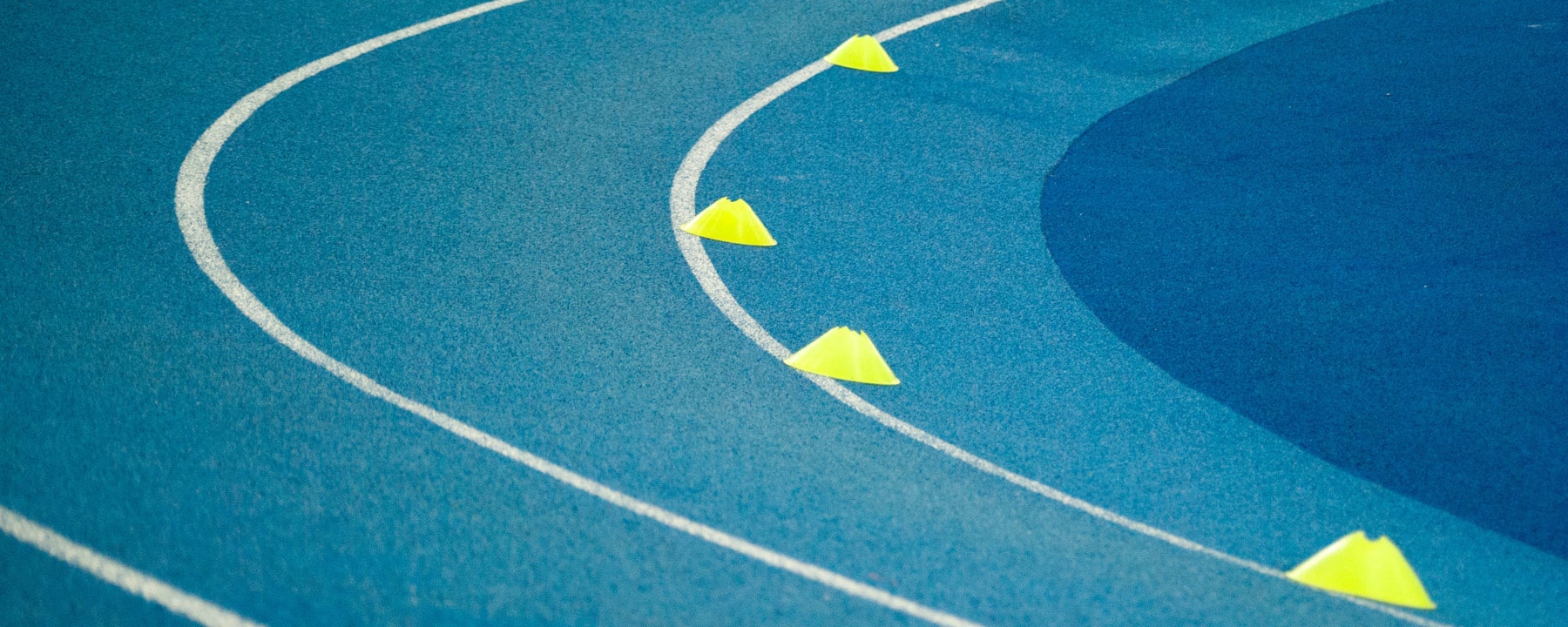 Tartan track in blue. Symbolic image for sports marketing events