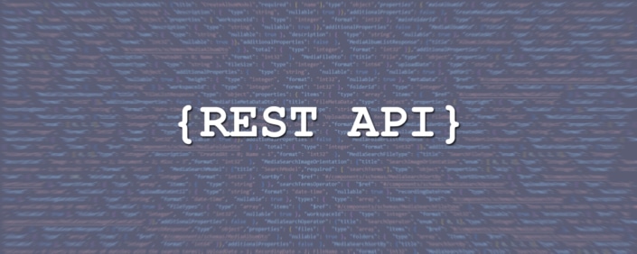 Header image: REST API lettering against a background with source code